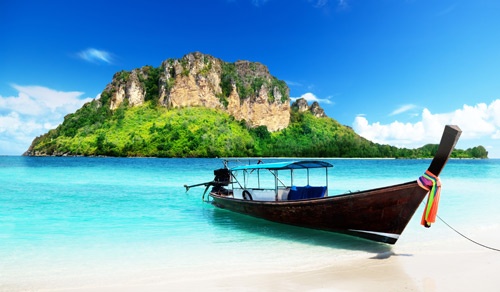 Indonesian boat to island with beautiful clear water 